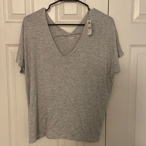 Express grey v neck shirt. New with tags. Size M